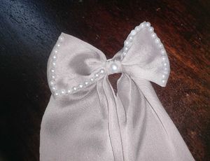 Pearl Head Band And A Hair Bow