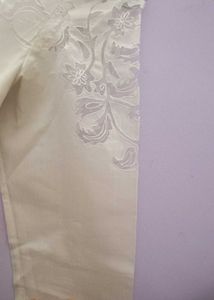 White Kurti With A Netted Design Hands &amp; Neck