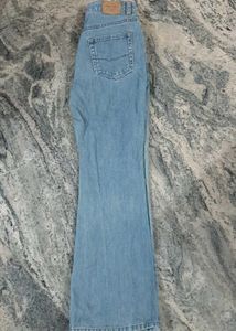 Boot-cut Light Blue Jeans.