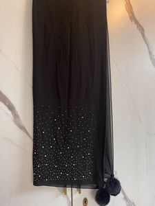 It’s a black beautiful party wear scarf