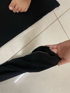 Chic Black Top with Ring Detail