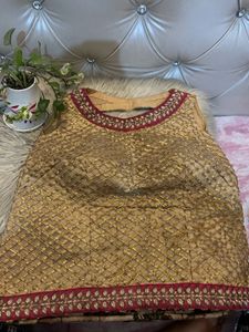 Backless golden choli