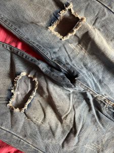 Flared Ripped Blue Jeans