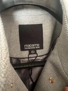 madame’s ice blue overcoat