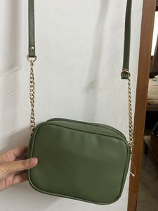 Party Wear Green Sling With Metal Chain Detail