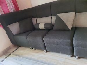 L-Shaped Sofa With 2 Cushions