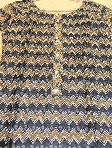 Elegant Kurta with Dupatta in shades of Green.
