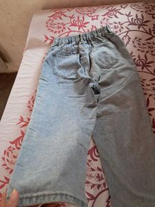 Distressed High-Waisted Denim Jeans