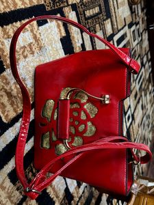 Red Handbag with Floral Detail