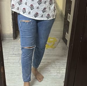Ripped Knee Denim Jeans