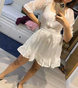 White Mini Dress with Puff Sleeves