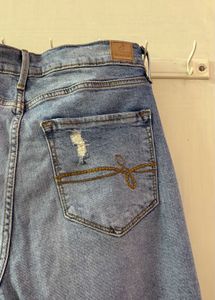 Ripped High-Waisted Jeans