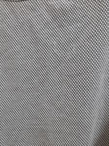 It&#39;s Black, White With a Slight Grey Shade In It. It Has a Circle Like Design, Very Comfy, Simple Yet Good Looking Top. It Is Stretchable. Pair It With A Black Jeans You Will Look Amazing.
