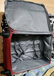 American Tourister Red DC Superlight Trolley Bag