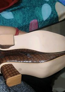 brown printed leather Hi neck boots....