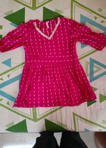 Pink tunic with white details