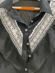 Elegant Black Shirt with White Lace Accent