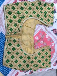 Green saree with multicolour details and glitter s