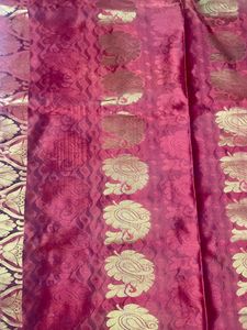 Orange kanchi Pattu Saree With Pink Pallu