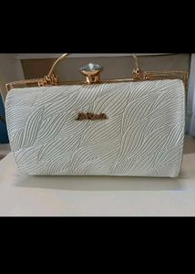 Elegant White Embossed Clutch with Gold Frame