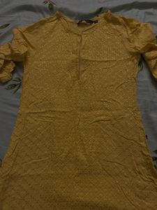 Yellow Kurti with Subtle Detailing
