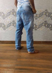 Ripped Blue Denim Jeans