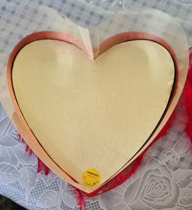 Red heart shaped satin box