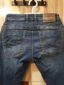 Ripped Blue Denim Jeans