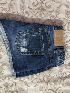 Ripped Denim Shorts