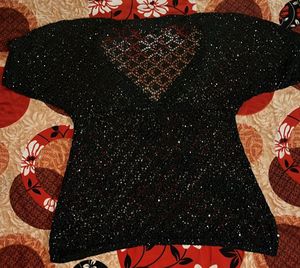 Black sheer top with little sequence work