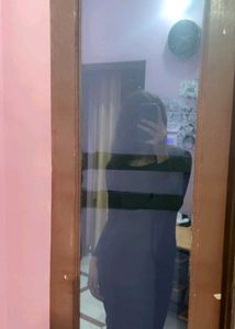 a black full sleeve bodycon dress