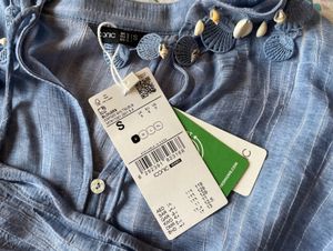 loose fit resort shirt with shell detail