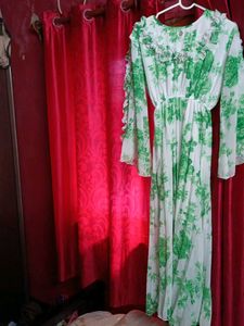 Green floral Print georgette Gown.