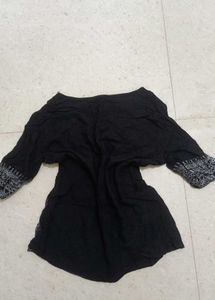 Kurti With Sequin And White Embroidery Like Detail