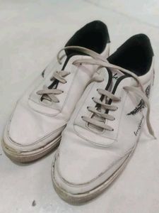 White Sneakers with Feather Design