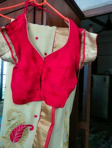 Cream Red Colour Saree With Blouse.