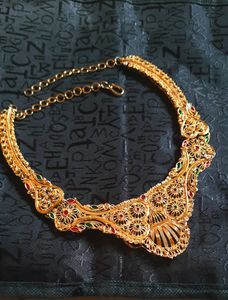 Gold Plated Set .Gorgeous look With Red And green meenakari Work.