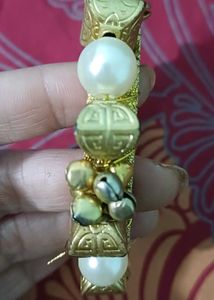 pearl and golden kada