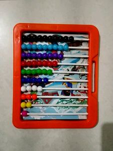 Kids Writing Slate With Abacus Behind