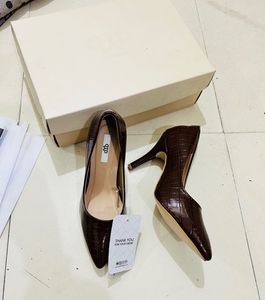 Elegant  woman closed  back stiletto heel