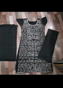 Black embellishments suit