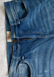 Distressed Denim Jeans