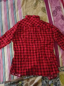 red and black check shirt