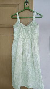 White and green printed dress