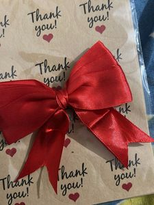 a pack of 5(60) thankyou stickers , bow and cluter
