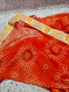 very pretty bandhani orange saree