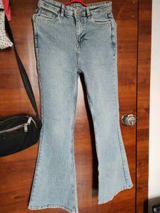 flared blue faded jeans