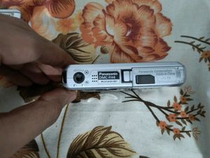 Nikon S1 And Panasonic Lumix Camera