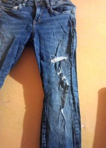 Ripped Blue Denim Jeans