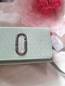 La Glory green sling bag